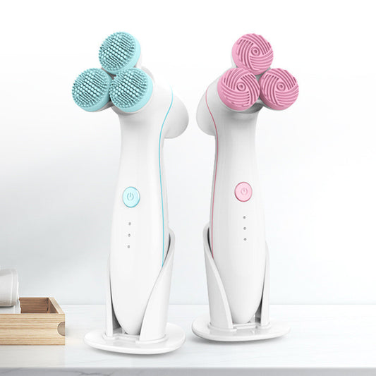 Two handheld cleaning brushes with blue and pink bristle heads on a white background