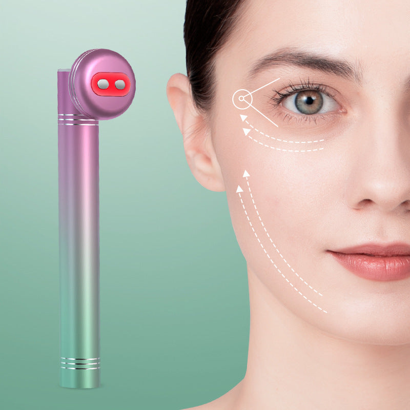 Woman using a pink facial device with a green background
