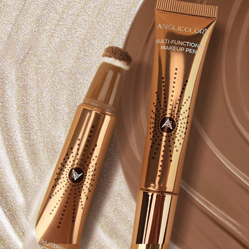 Makeup pen with brush on a beige background