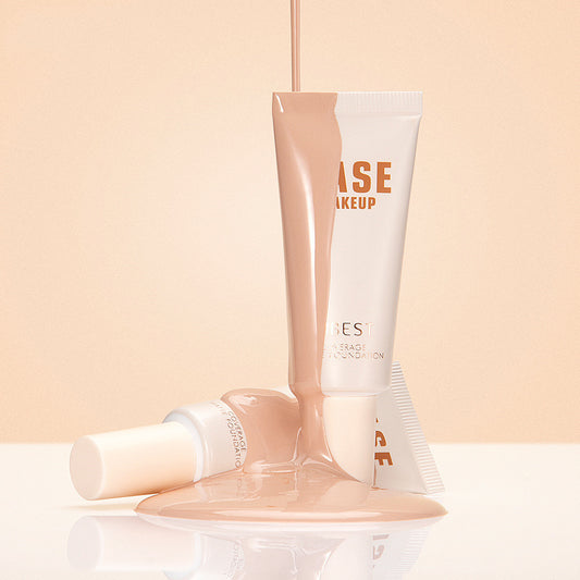 Foundation tube with applicator on a beige background